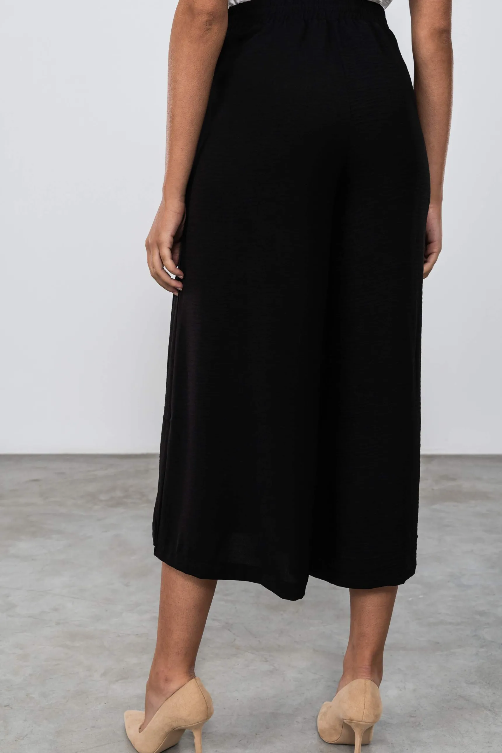 faldapantaln_botones_negr_7.webp Precchio Faldas<FALDA-PANTALÓN BOTONES NEGRO