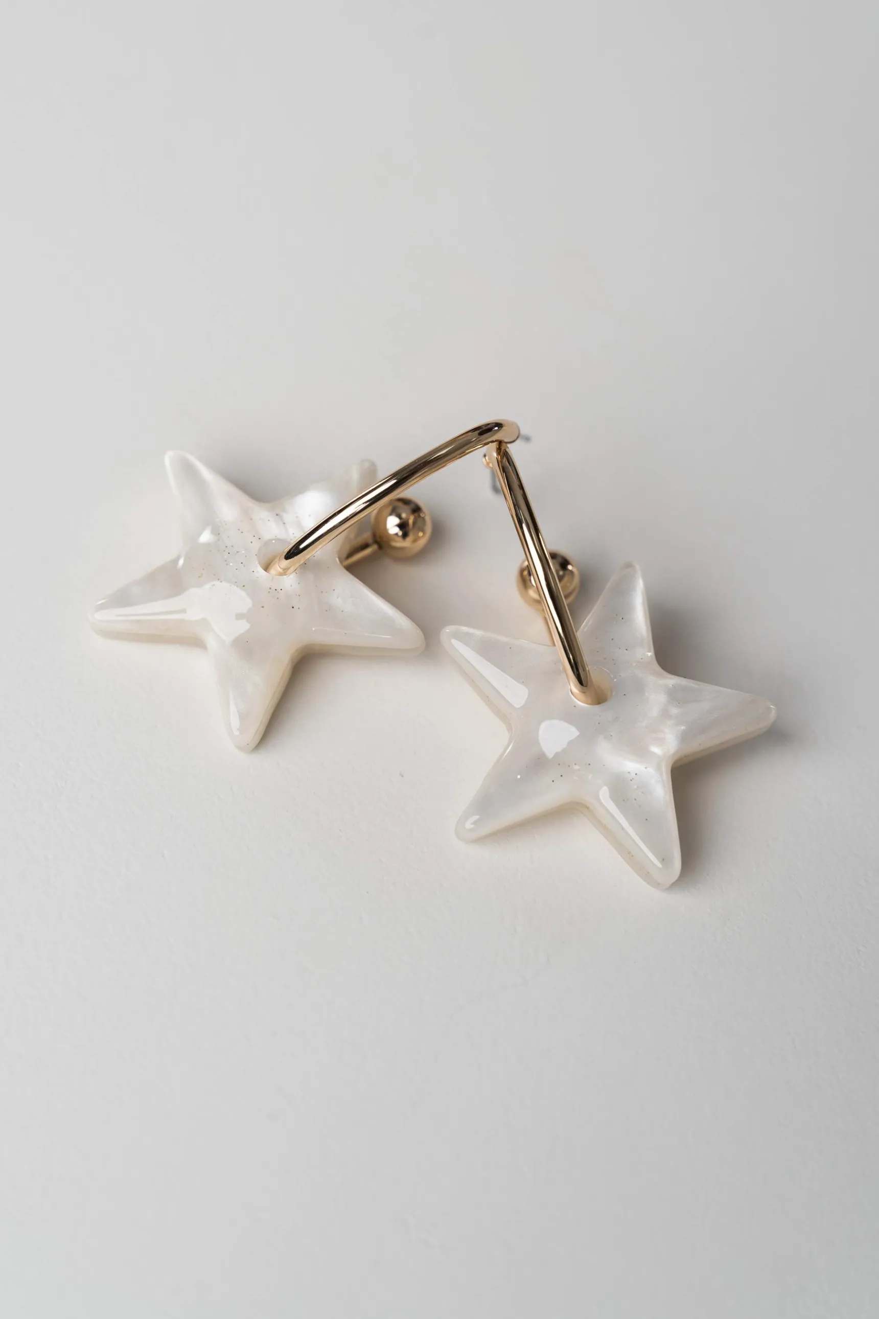 pendiente_estrella_ncar_2.webp Precchio Bisuteria<PENDIENTE ESTRELLA NÁCAR